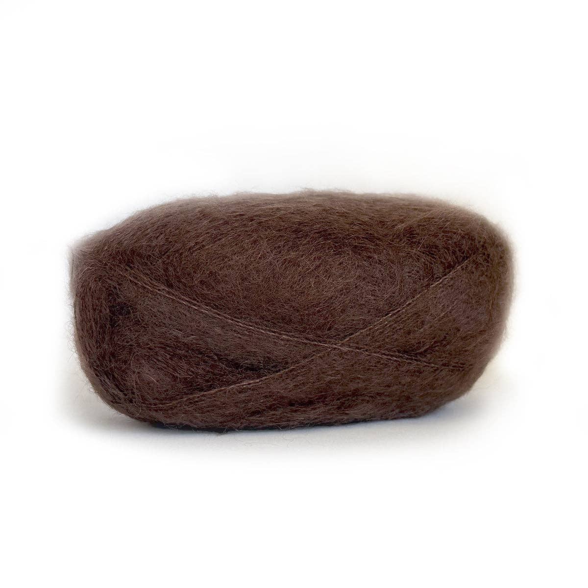 Kelbourne Woolens Harmony yarn in rich brown color, perfect for knitting and crocheting projects