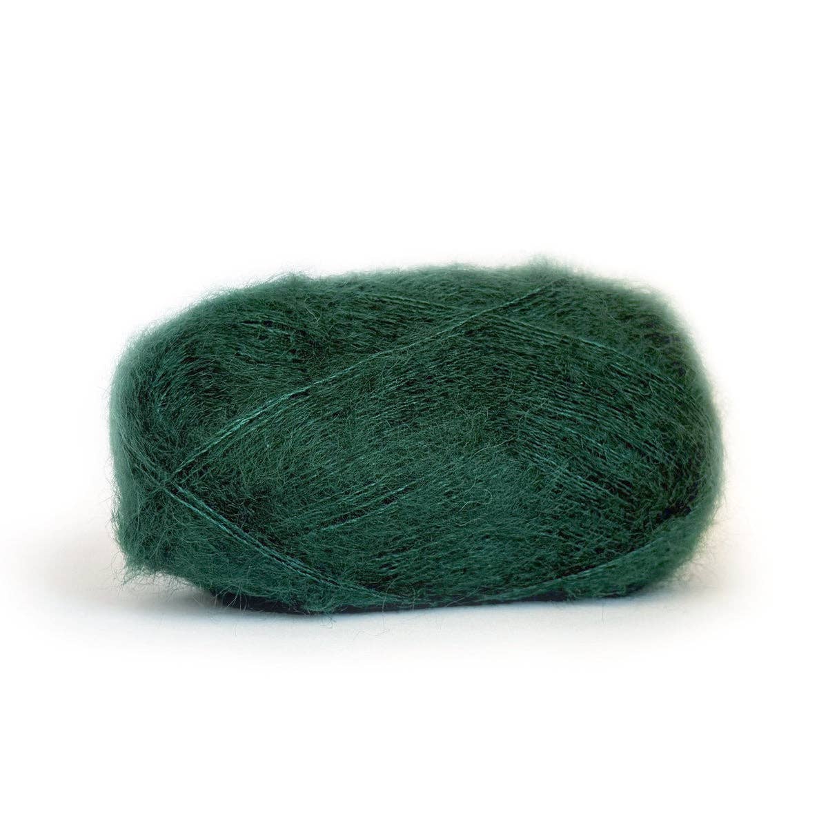 Kelbourne Woolens Harmony yarn in green, soft and lightweight for knitting and crochet projects