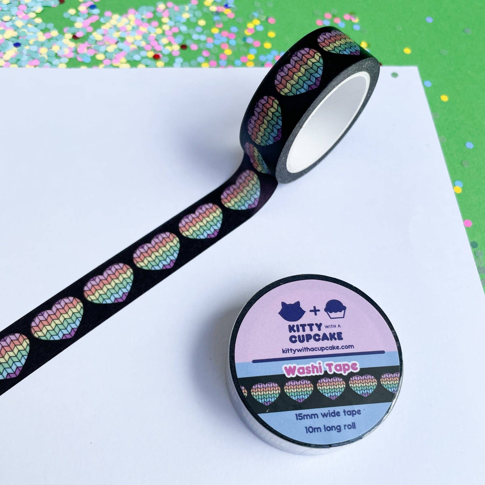 Kitty With A Cupcake Wasdi washi tape featuring colorful heart patterns on a black background