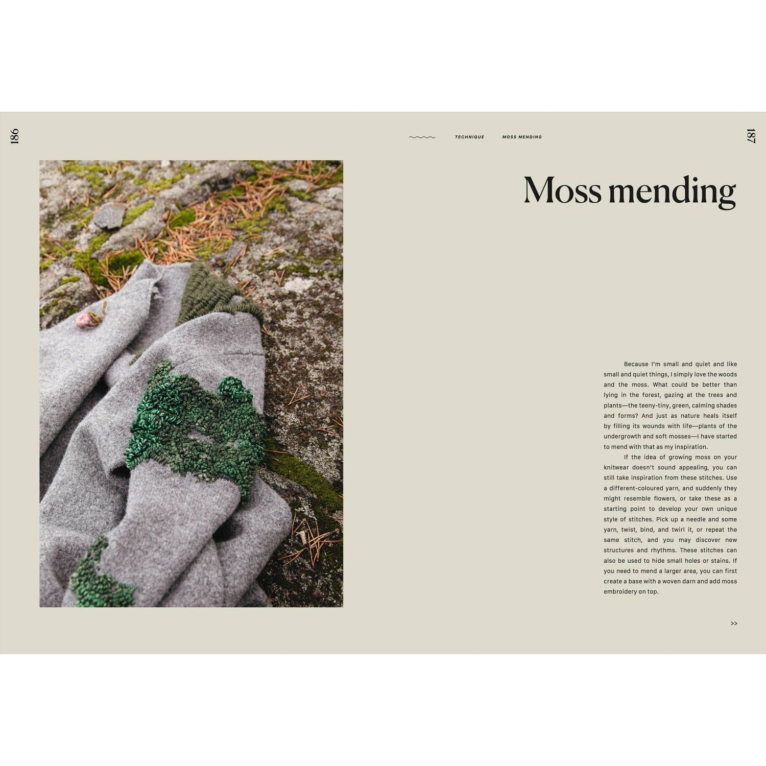 Gray knitted sweater with moss mending detail on a rocky surface, perfect for showcasing knitting knits
