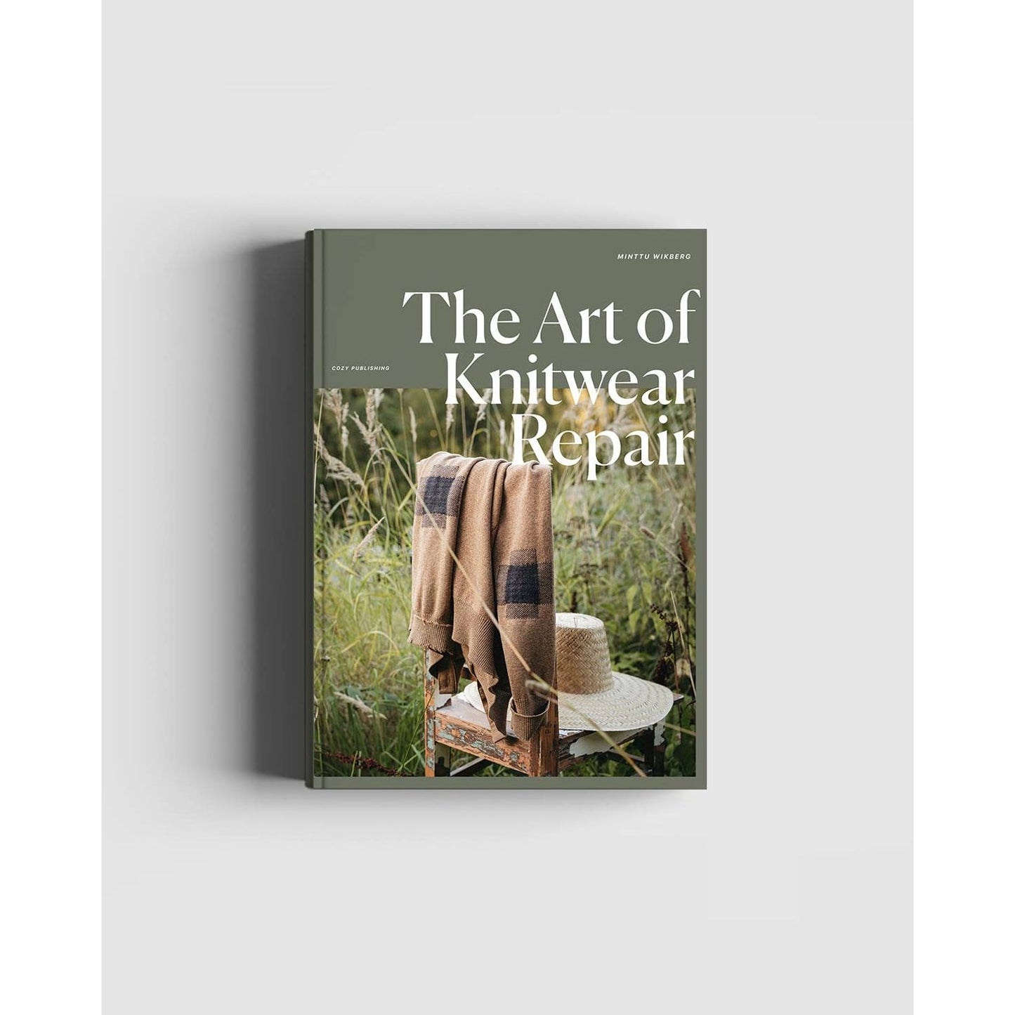 The Art of Knitwear Repair book by Cozy Publishing features cozy knitting knits and repair techniques
