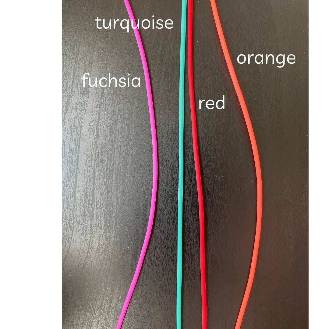 Assorted knitting tools in turquoise, fuchsia, red, and orange colors from Comma Craft Co