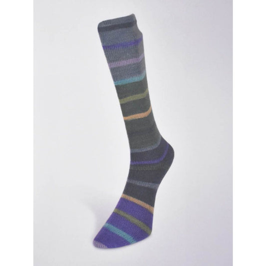 Hand-knit sock made from Laines du Nord Indulgence sock yarn in shades of gray and colorful stripes