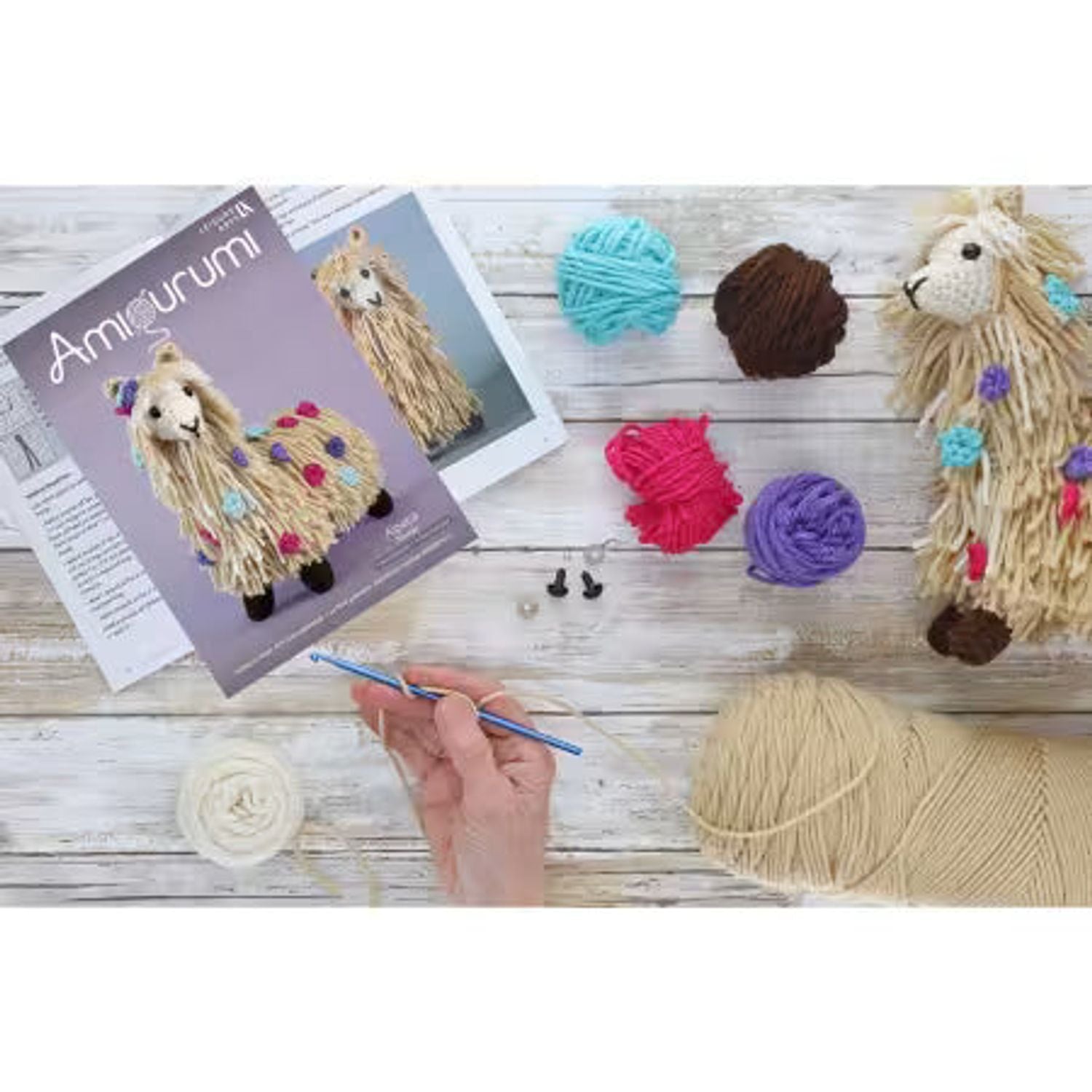 Leisure Arts amigurumi kit lamb with yarn and crochet supplies for crafting fun projects