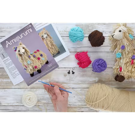 Leisure Arts amigurumi kit lamb with yarn and crochet supplies for crafting fun projects