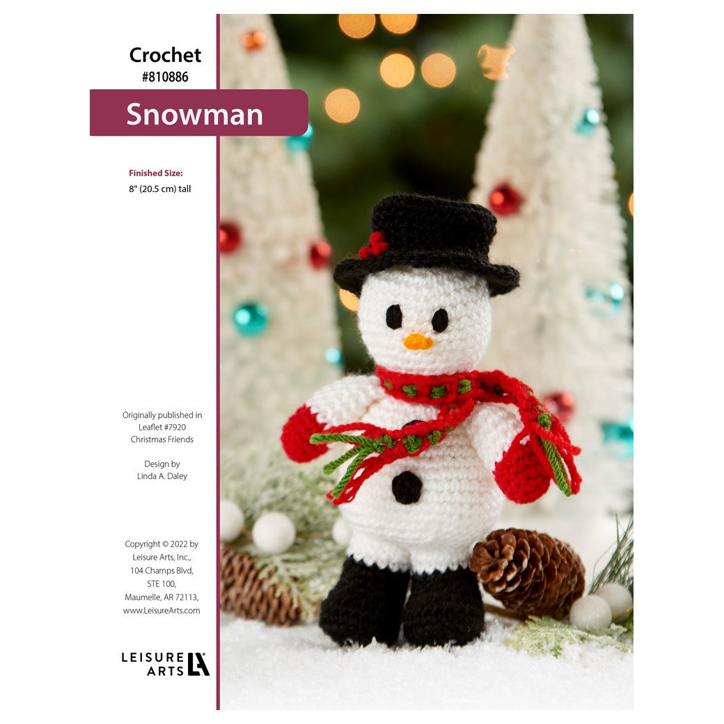 Holiday amigurumi crochet kit featuring a snowman with a black hat and red scarf