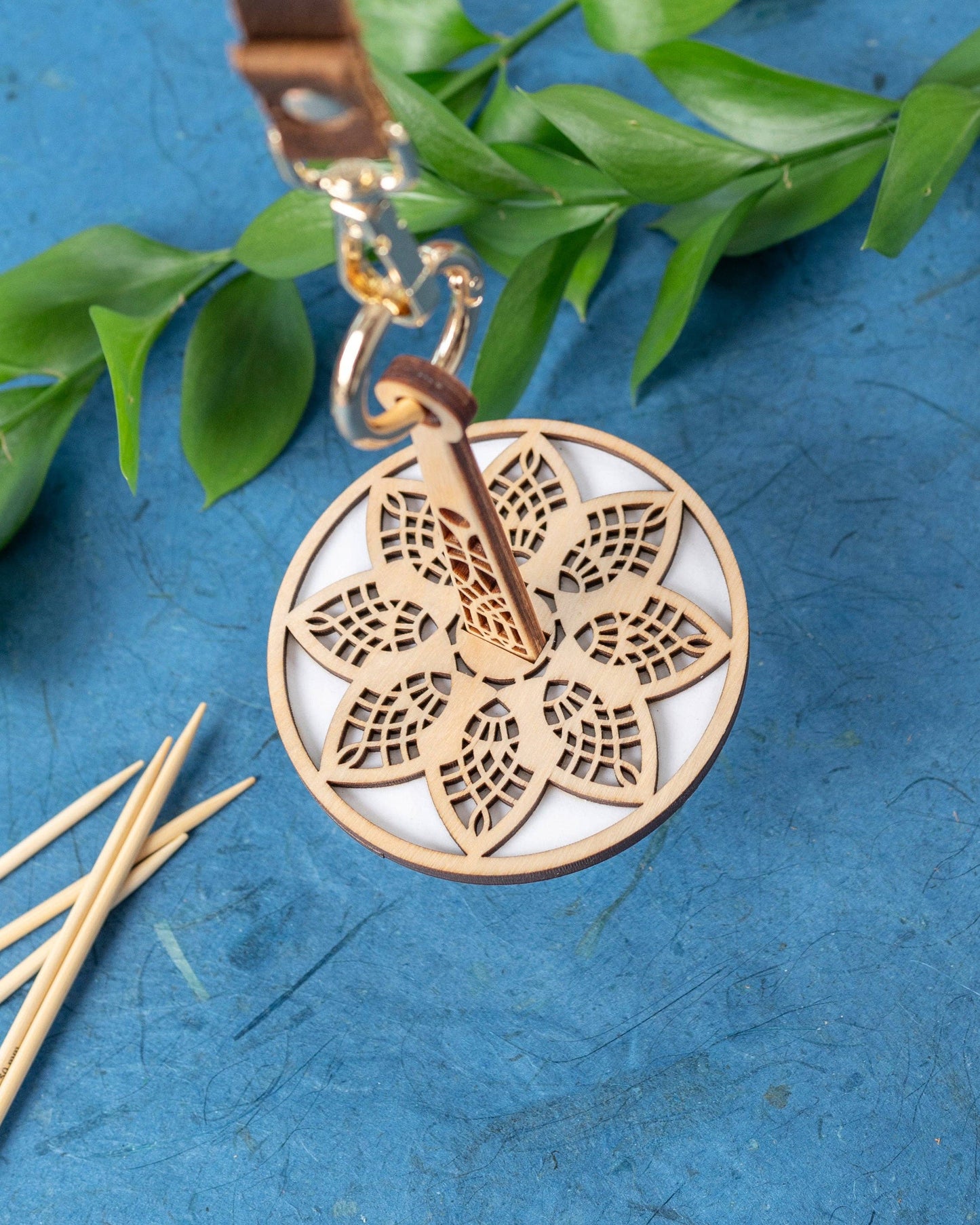 Wooden mandala stitch marker keychain with leather strap and laser cut floral design for projects lemonwood crochet notions