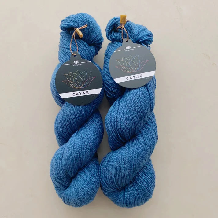 Cayak Blue Yarn by Lotus Yarns, showcasing soft texture and vibrant color for knitting and crocheting projects