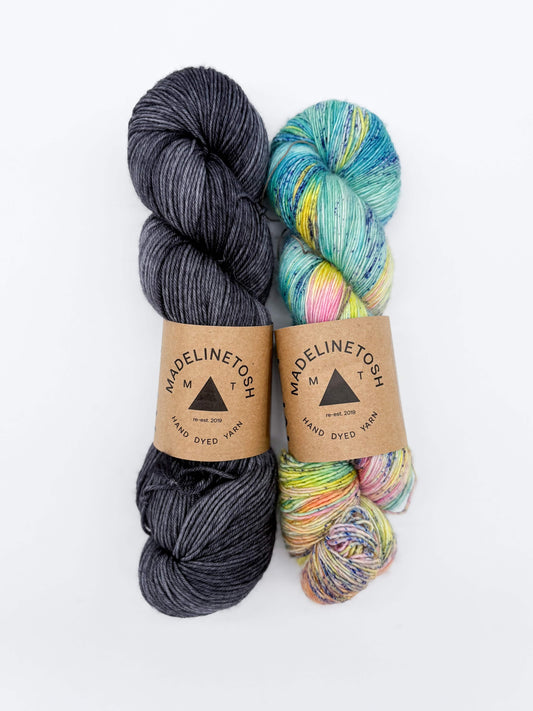 Madelinetosh Winging It Shawl Kit featuring two skeins of hand-dyed yarn in vibrant colors