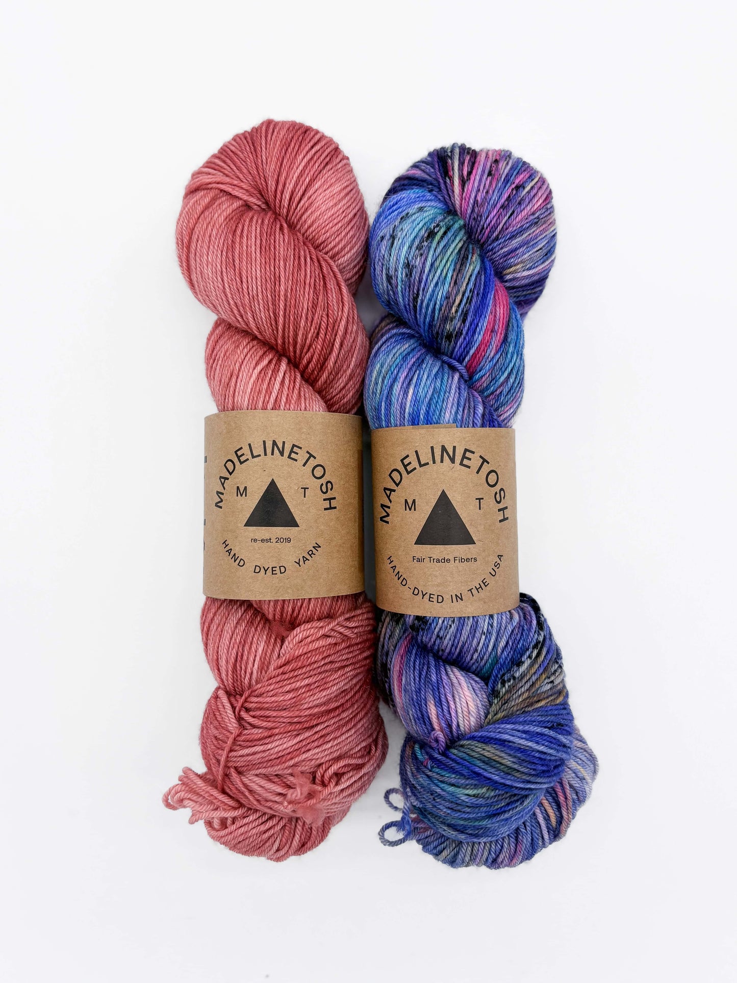 Madelinetosh Winging It Shawl Kit featuring two hand-dyed yarns in pink and colorful blue tones