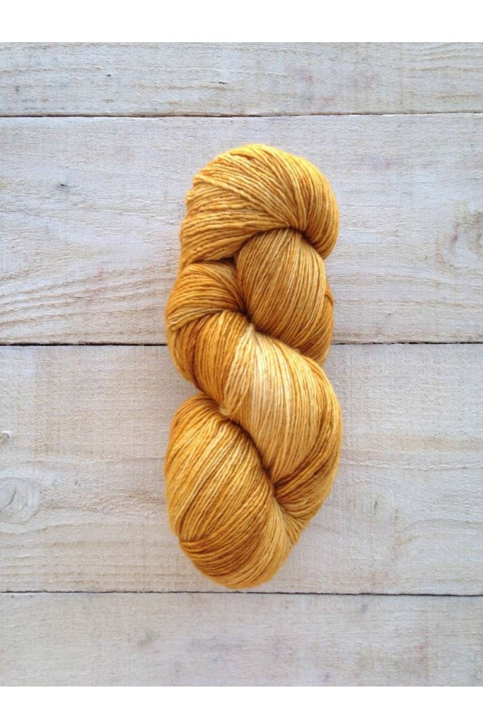 Manos del Uruguay Fino Gilt