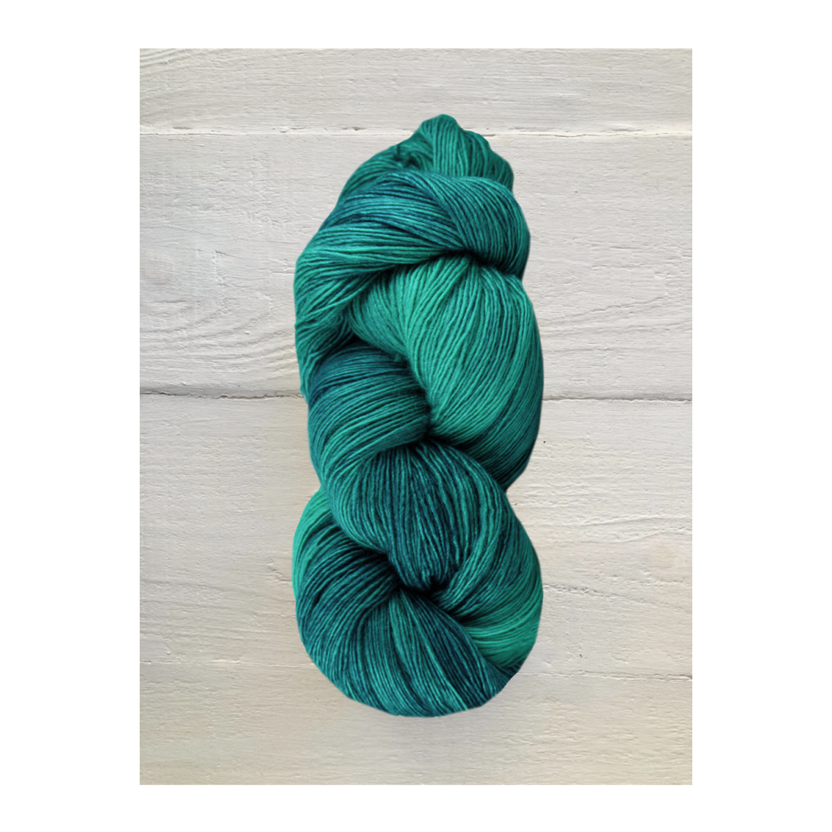 Manos del Uruguay Fino yarn in rich teal shades ideal for knitting and crafting projects