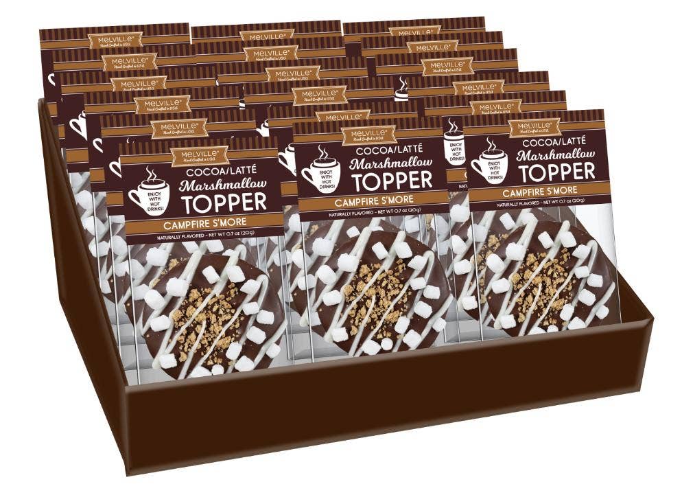 Melville Candy cocoa toppers display featuring Campfire S'more flavor with chocolate and marshmallow