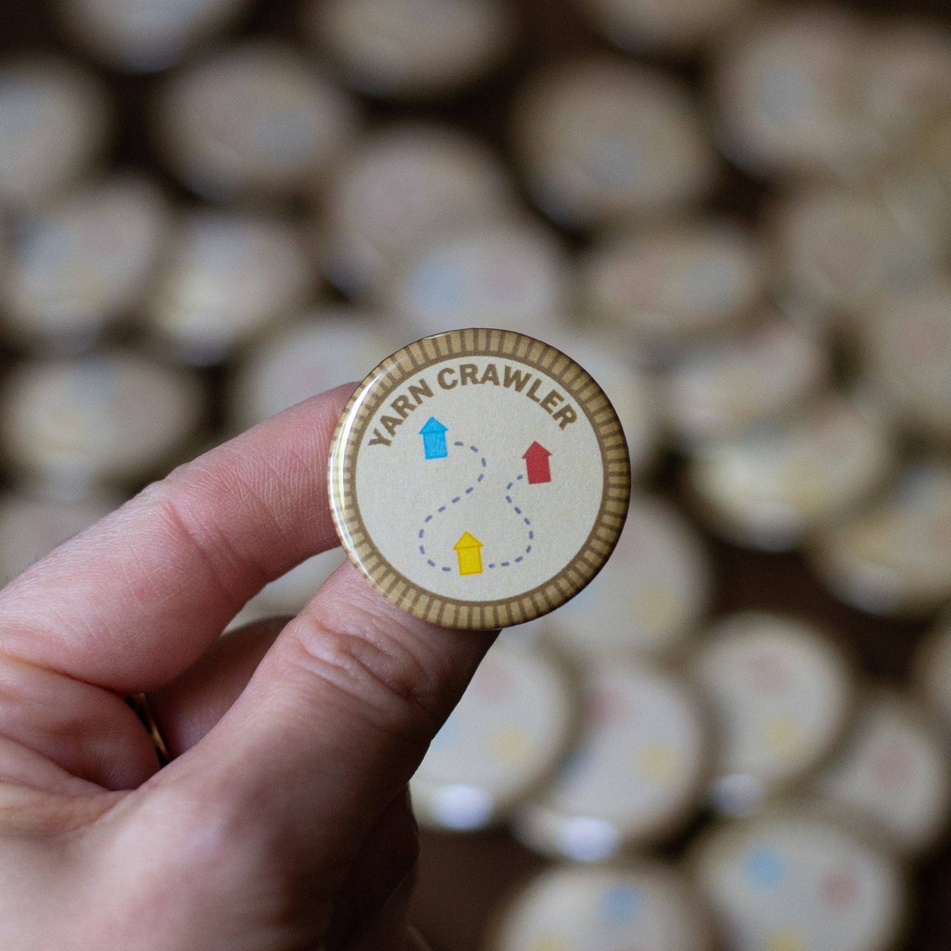 Yarn Crawler Badge for Crafting Enthusiasts Featuring Colorful Arrows for Michaels Crafts Yarn
