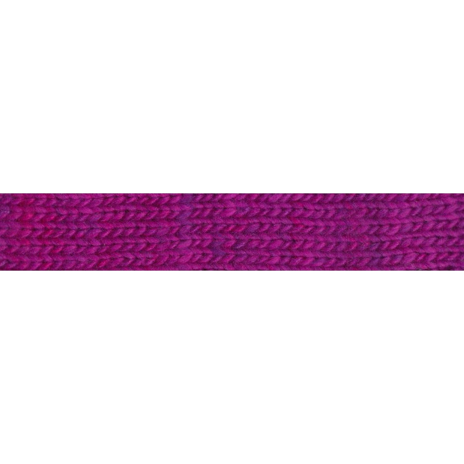 Close-up of Noro Sonata yarn in vibrant purple hues with a soft texture for knitting and crocheting projects