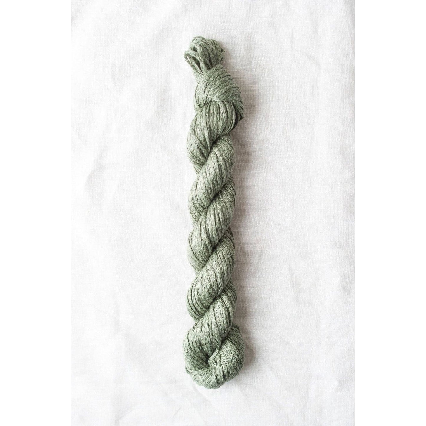 Soft green organic Italian yarn from Quince & Co. perfect for eco-friendly knitting projects