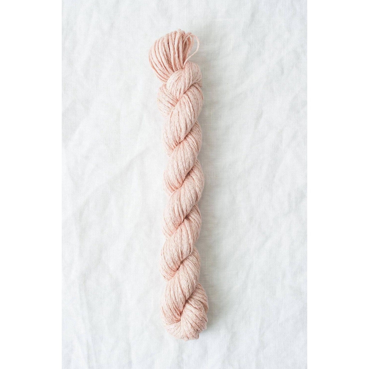 Quince & Co. organic Italian yarn in light pink, perfect for knitting and crafting projects