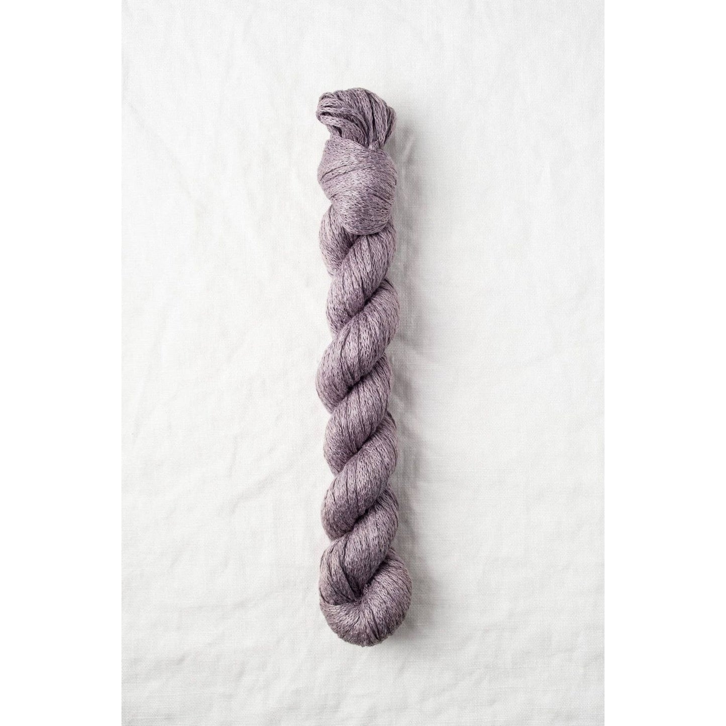 Quince & Co. organic Italian yarn in soft lavender color, perfect for knitting and crafting projects