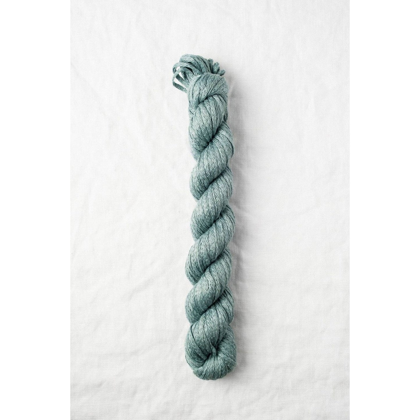 Quince & Co. organic Italian yarn in soft teal color for knitting and crochet projects
