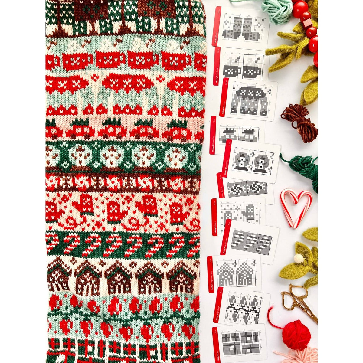 Colorful knitted fabric with Christmas holiday cards design patterns for festive crafting projects