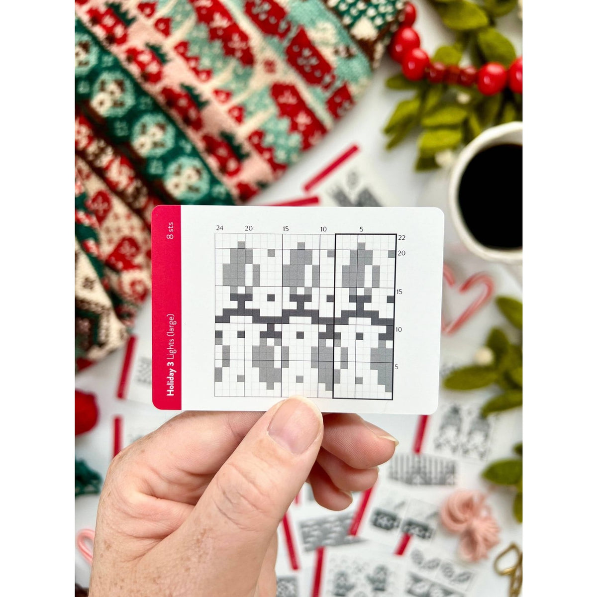 Handheld Christmas holiday cards design pattern for festive crafting ideas