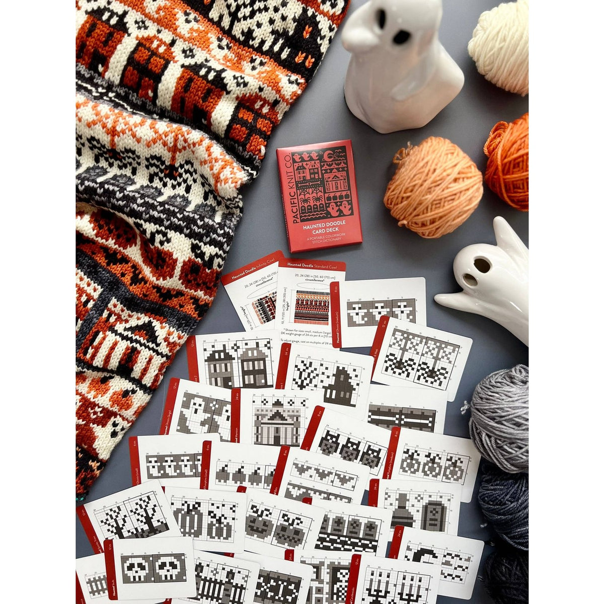 Twice Sheared Sheep deck of card featuring colorful knitting patterns with yarn and decorative accessories