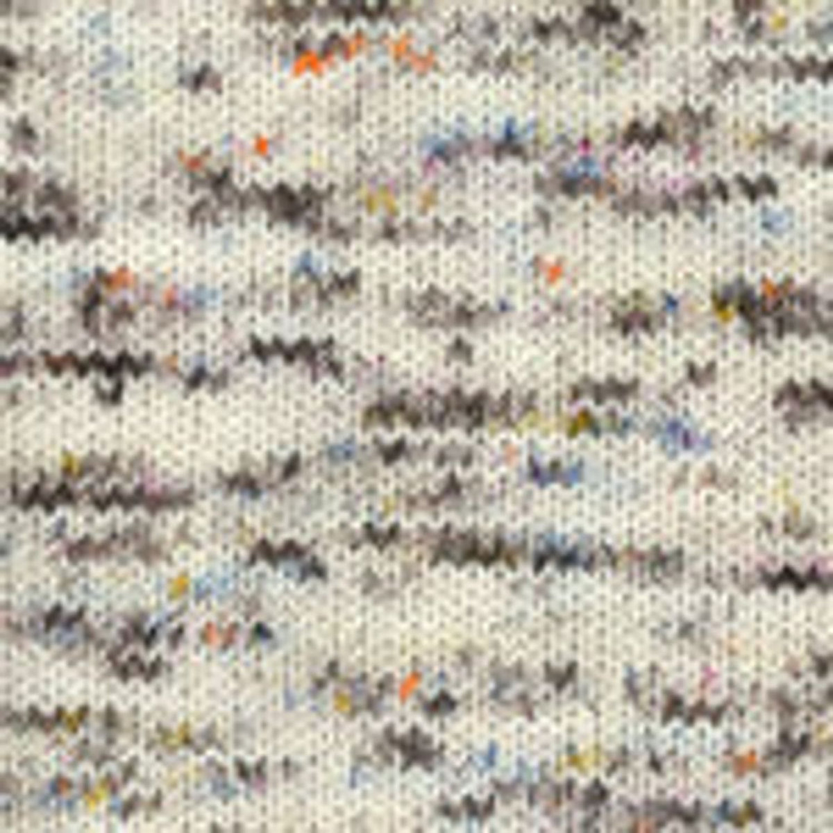 Plymouth Yarn in soft beige with colorful specks, perfect for creating joyful projects like happy feet happy