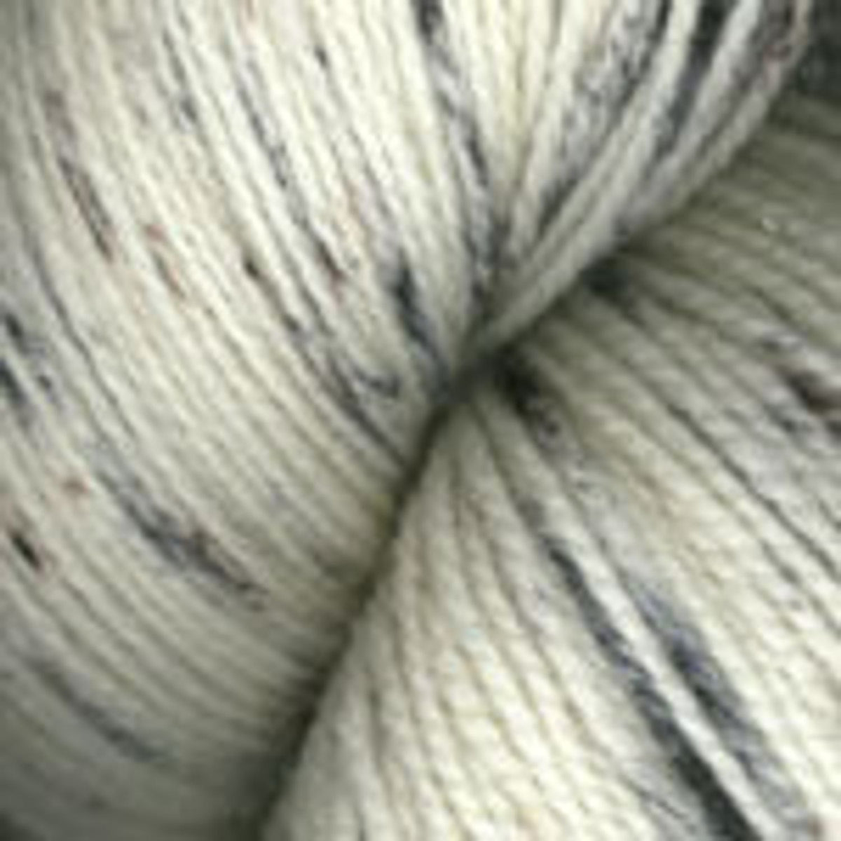 Plymouth Yarn Happy Feet Happy yarn in light cream with subtle gray speckles for cozy projects