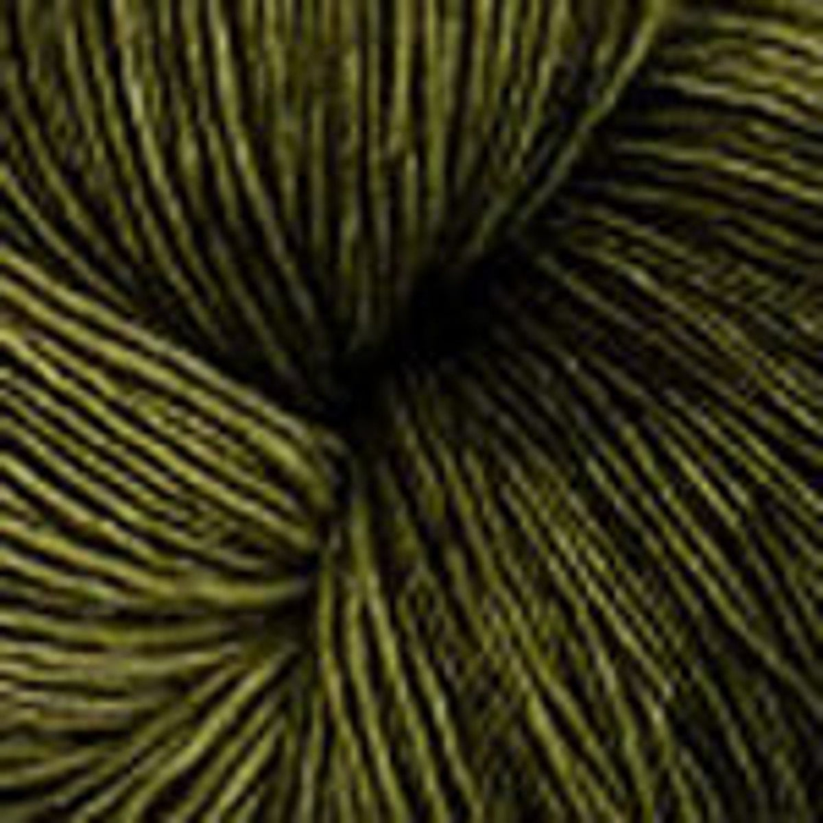 Close-up of olive green yarn Plymouth, perfect for a variety of knitting and crocheting projects