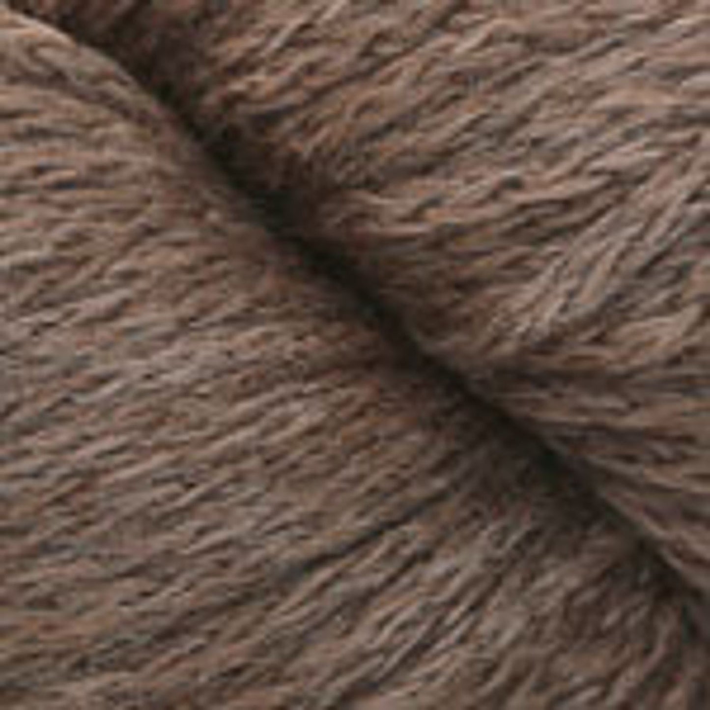 Plymouth Yarn Viento 100 in rich brown hues, perfect for creating cozy knitted projects