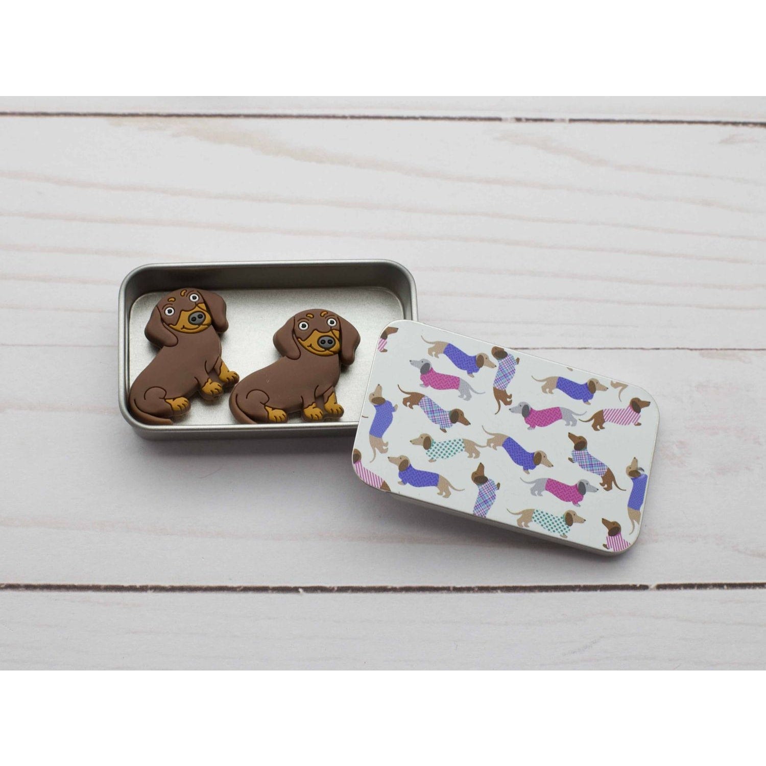 Print slide top storage tins featuring cute dog designs, perfect for organizing small items
