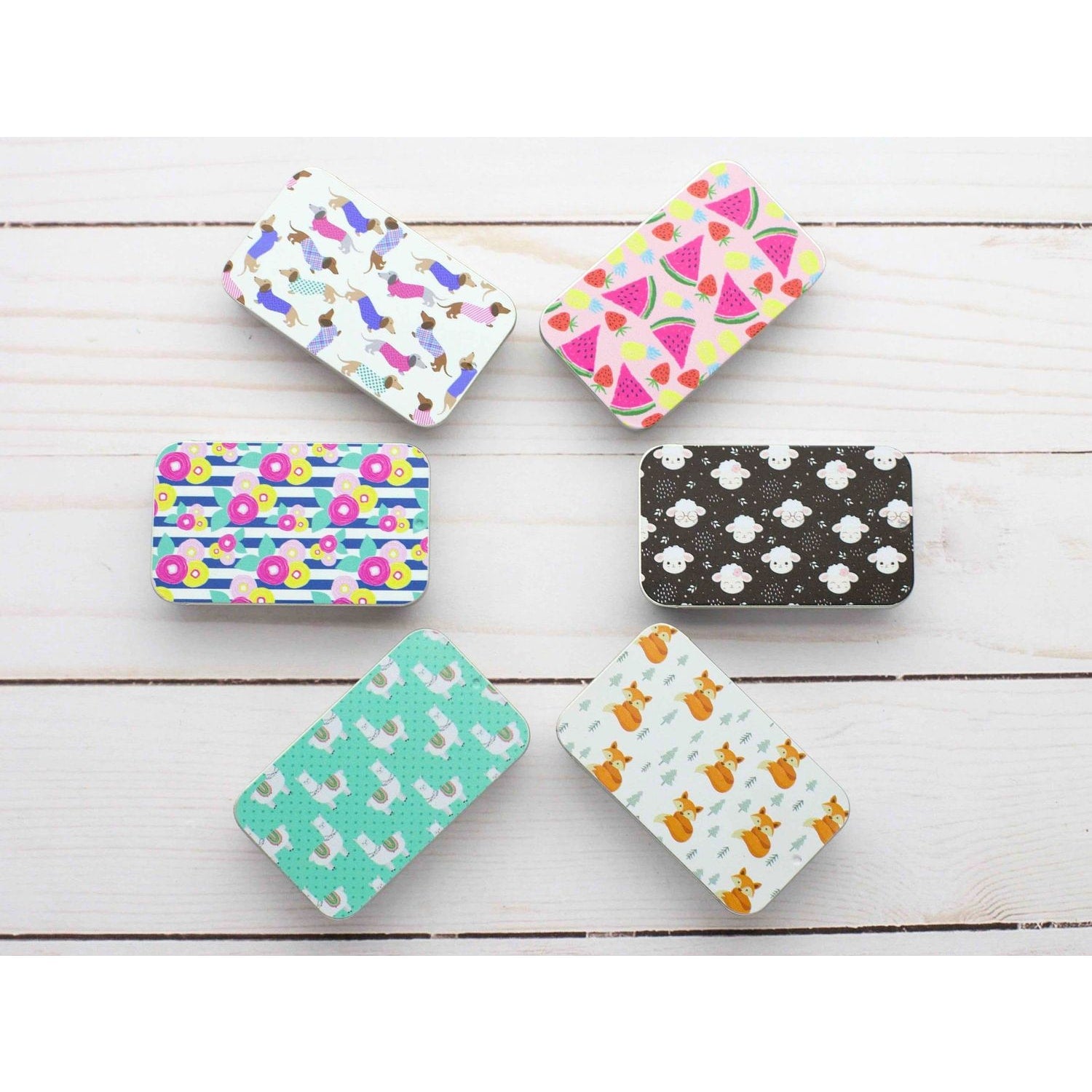 Colorful print slide top storage tins in various designs from Fox & Pine Stitches