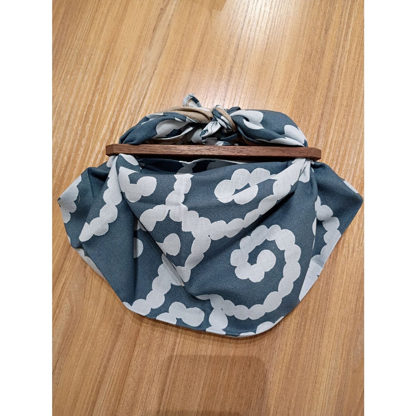 AriYARN reusable shopping bag in blue with white swirling patterns, ideal for eco-friendly shopping.
