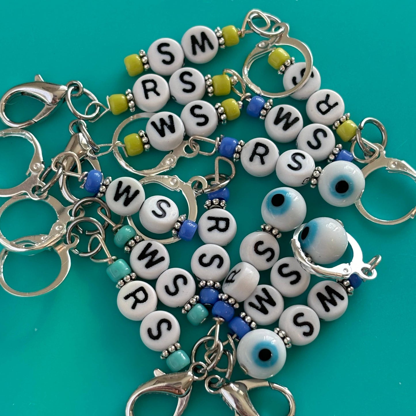 Right side wrong side knitting stitch markers in vibrant colors for easy project tracking