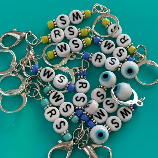 Right side wrong side knitting stitch markers in vibrant colors for easy project tracking