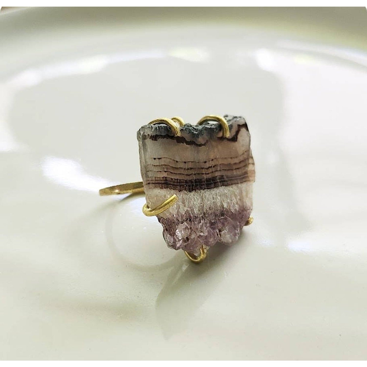 Sara Sela jewelry amethyst ring raw banded amethyst slice with purple druzy and gold prong setting on thin gold band