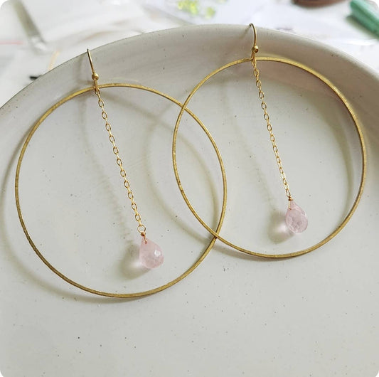 Sara Sela Jewelry rose quartz hoop earrings gold hoops with delicate chain and teardrop pink stones
