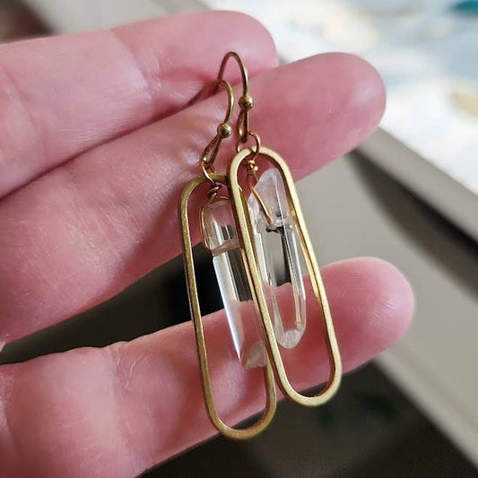 Sara Sela Jewelry wire wrapped quartz crystal earrings with gold brass elongated oval frames and French hooks