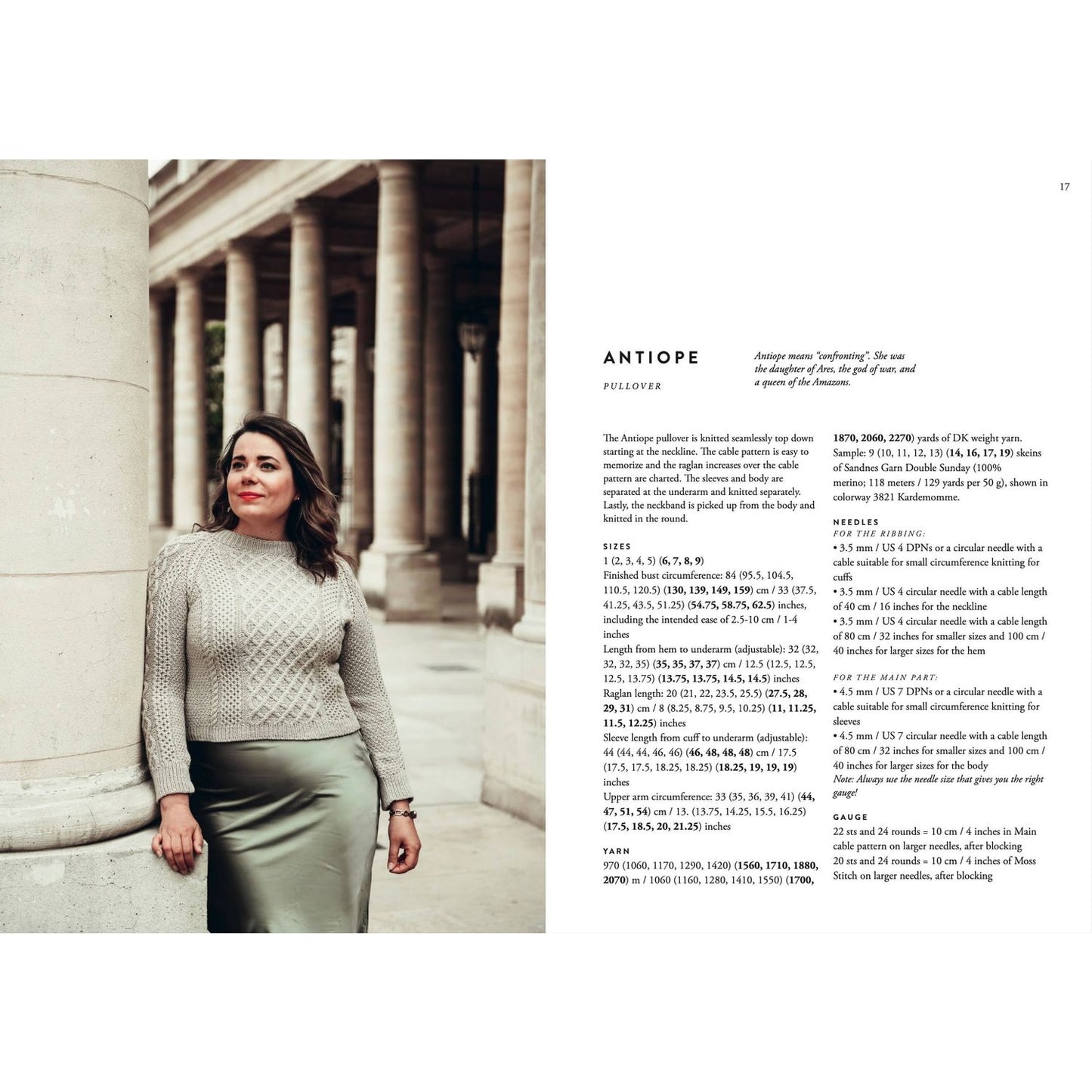 Model showcasing elegant sweater design featuring patterns in knitting against a historic column backdrop