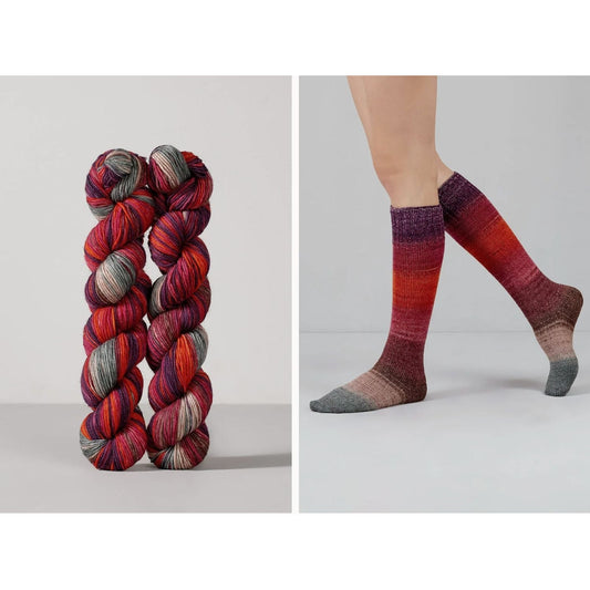 Urth Yarns sock yarn in vibrant red and orange hues, perfect for creating stylish socks