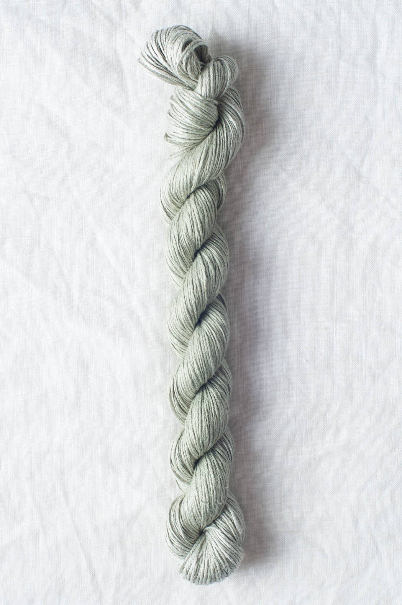 Quince & Co. Sparrow organic linen yarn in a soft gray twist for eco-friendly crafting