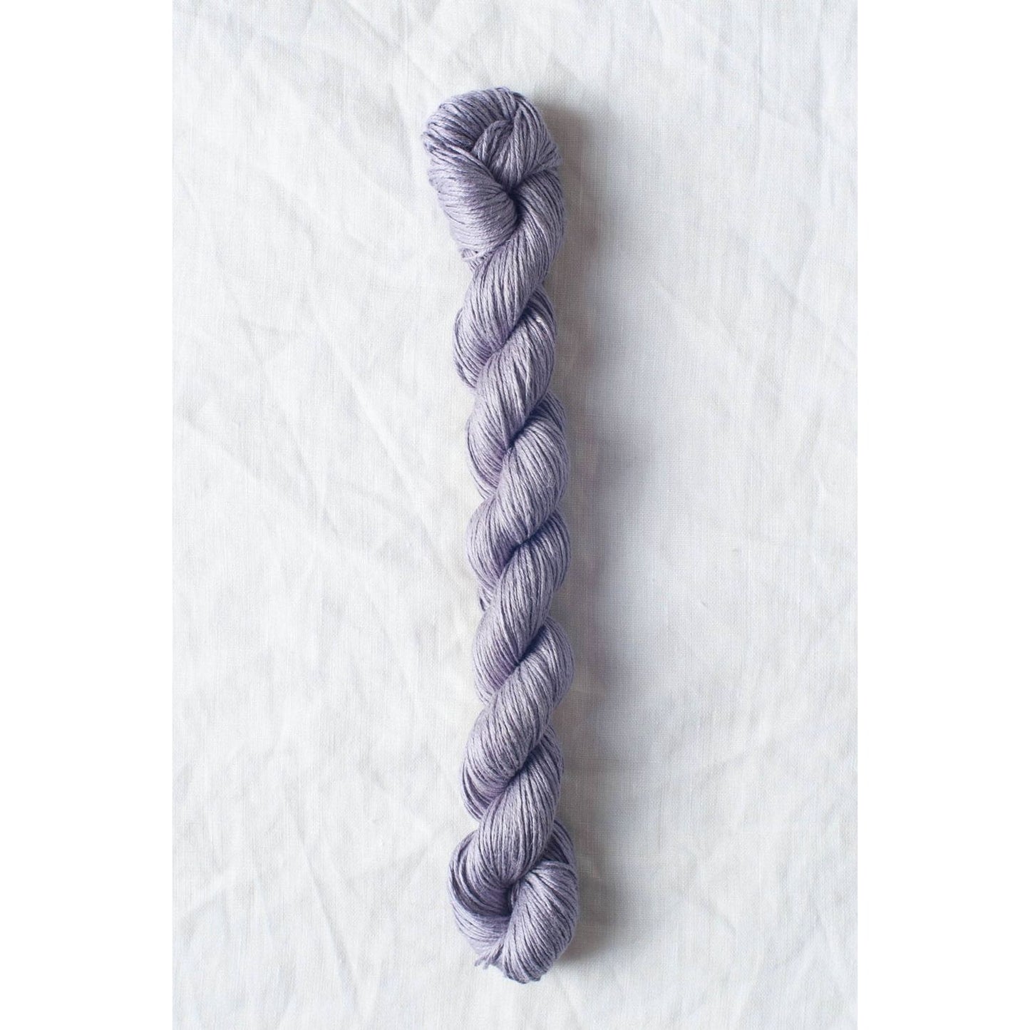 Sparrow organic linen yarn in soft lavender color perfect for eco-friendly knitting projects