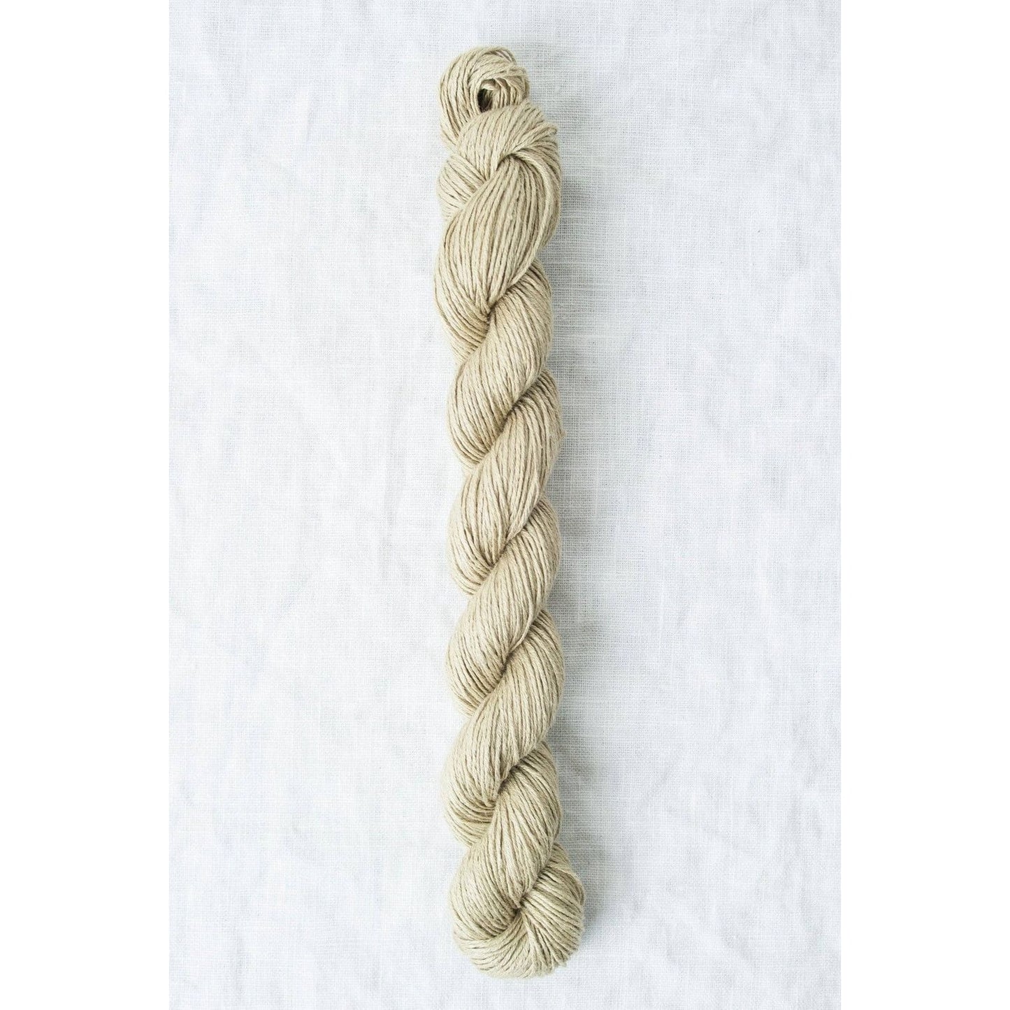 Natural Quince & Co Sparrow organic linen yarn in a twisted skein for eco-friendly knitting