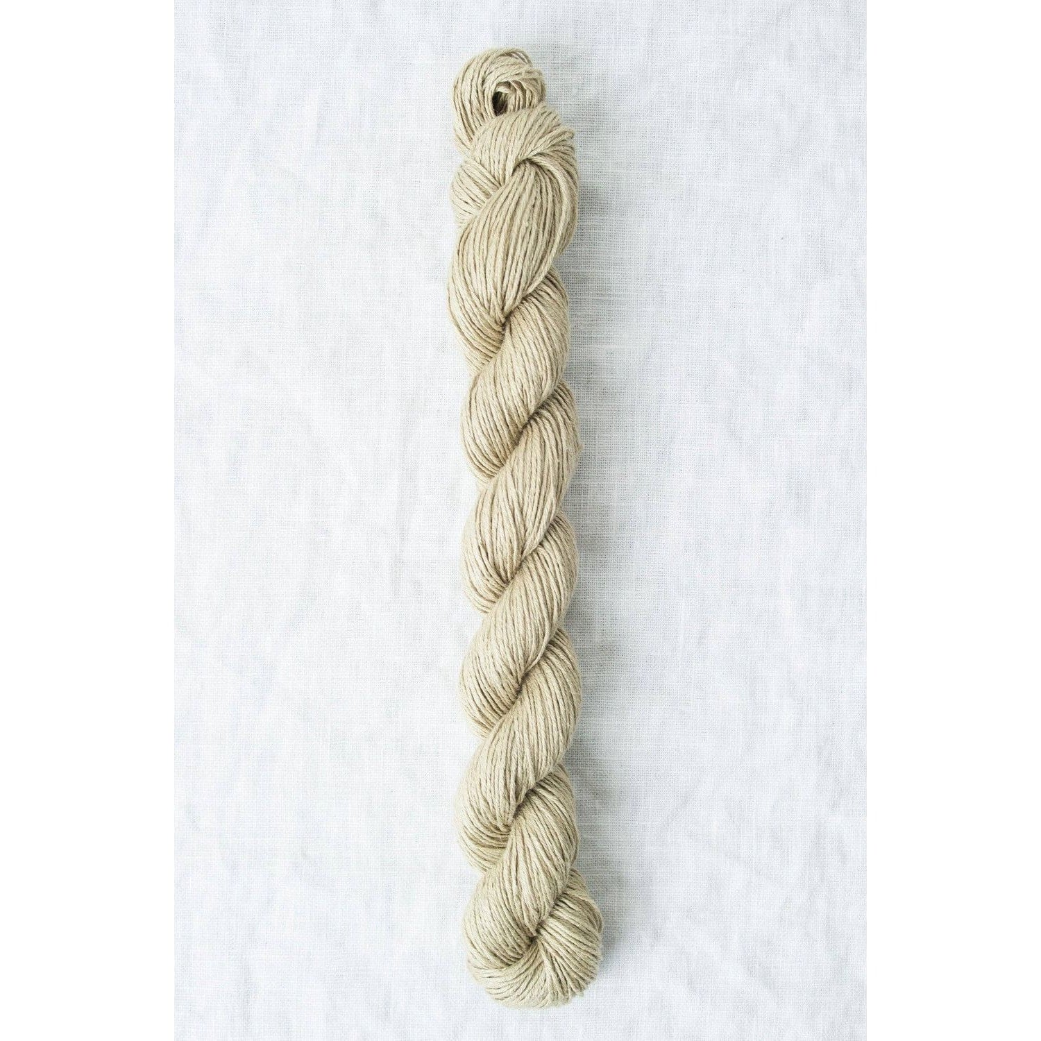 Natural Quince & Co Sparrow organic linen yarn in a twisted skein for eco-friendly knitting