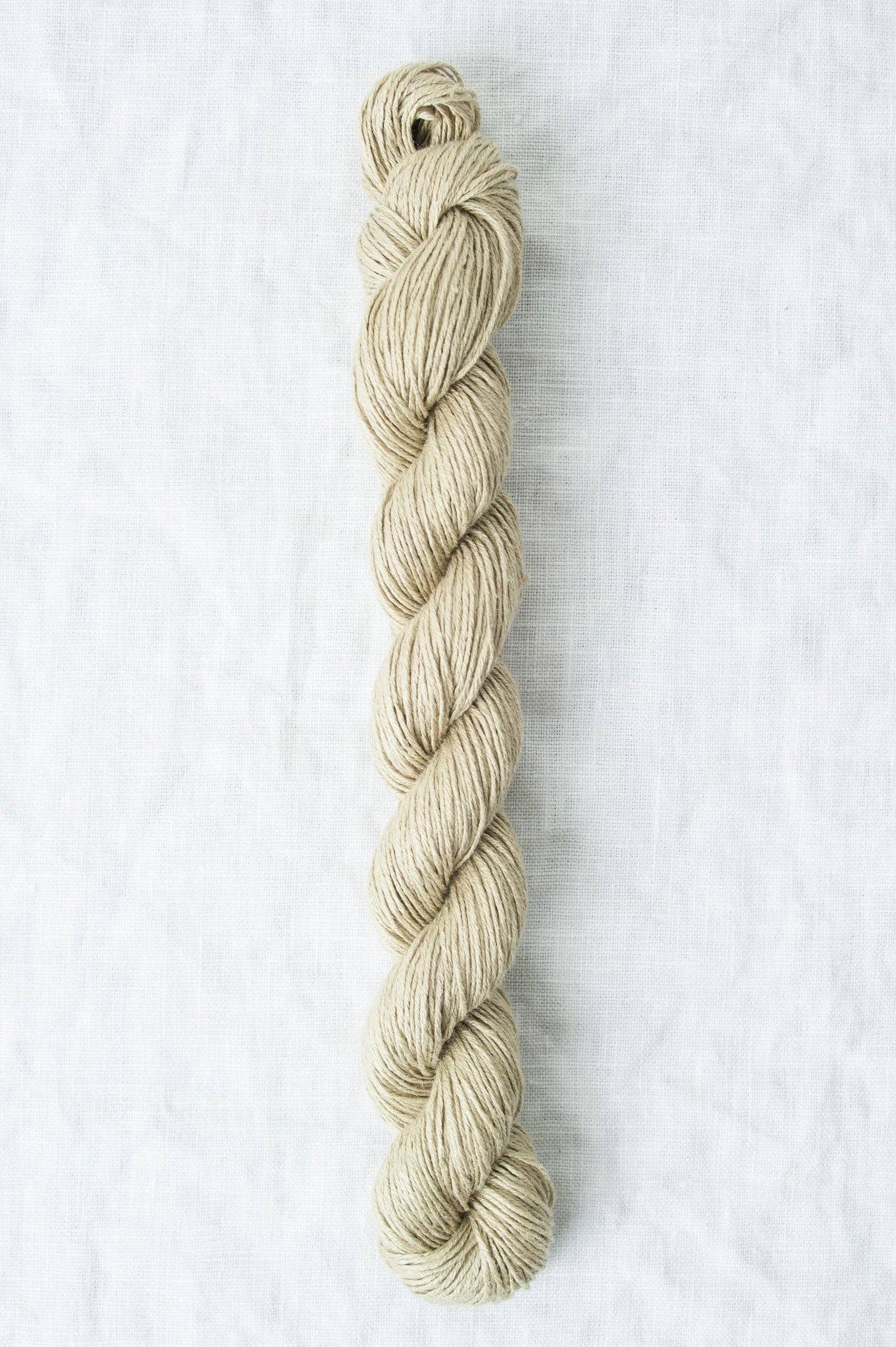 Natural Quince & Co Sparrow organic linen yarn in a twisted skein for eco-friendly knitting