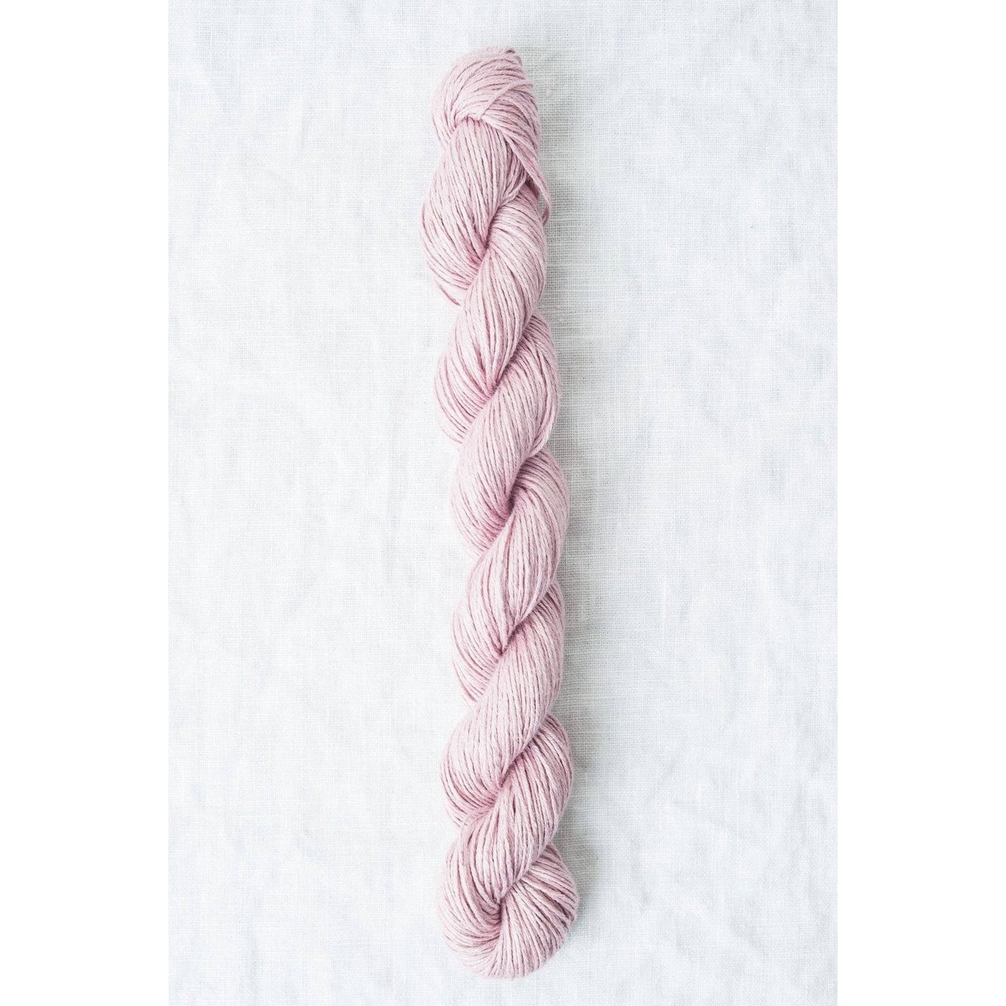 Sparrow organic linen yarn in soft pink shade, ideal for eco-friendly knitting projects