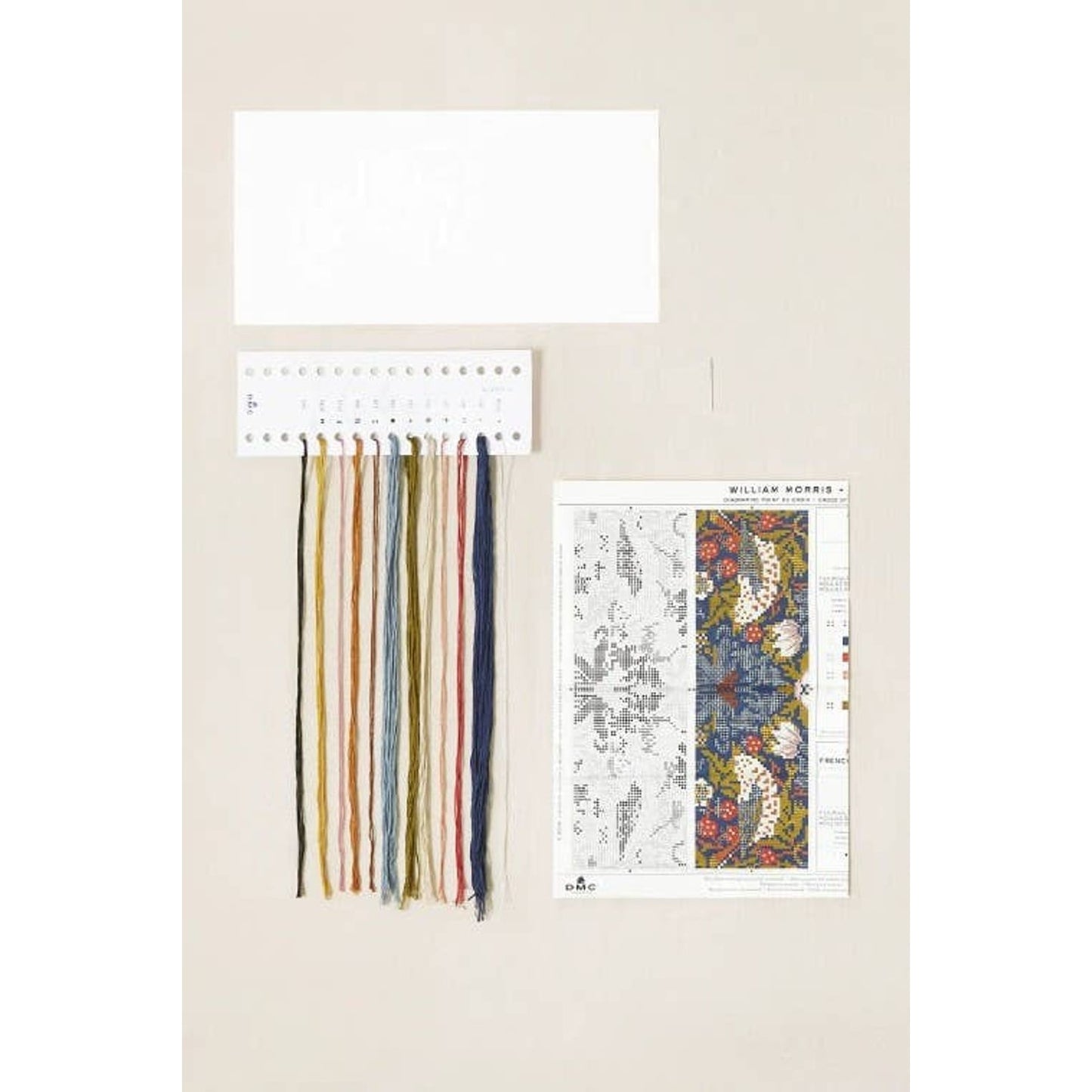 DMC cross stitch kit featuring colorful threads and a detailed pattern for stitching cross stitch projects
