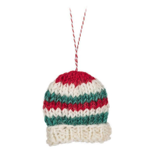 Knit striped Christmas hat decoration in red, green, and white for festive home décor