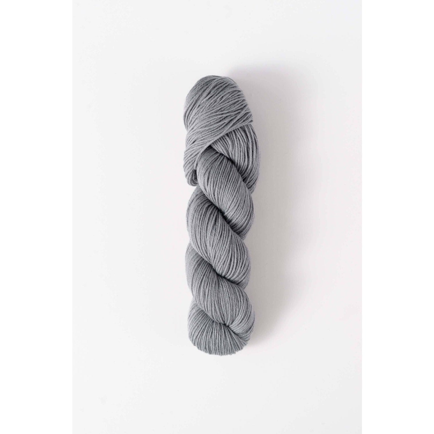 Quince & Co. light gray superwash merino fingering yarn skein for knitting and crocheting