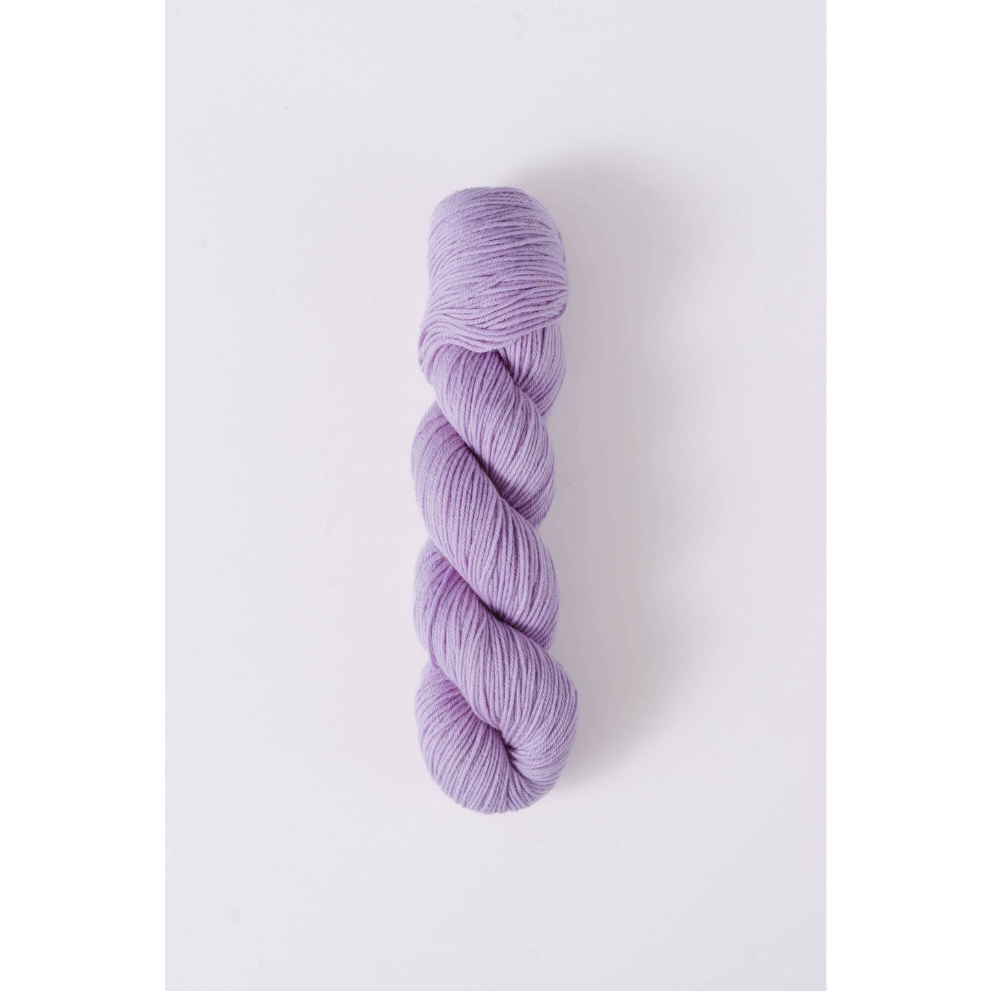 Quince & Co. superwash merino fingering yarn in soft lavender color skein